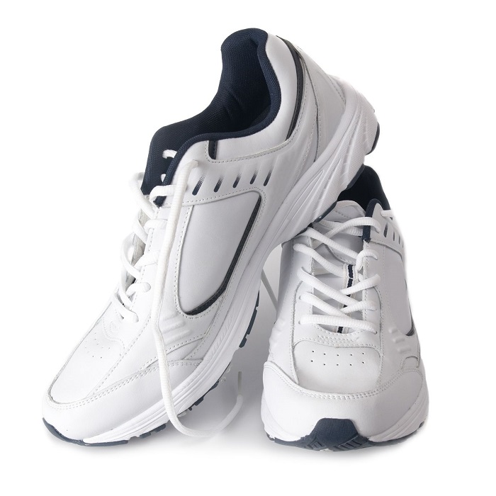 10492460 - pair white of trainers on isolated background